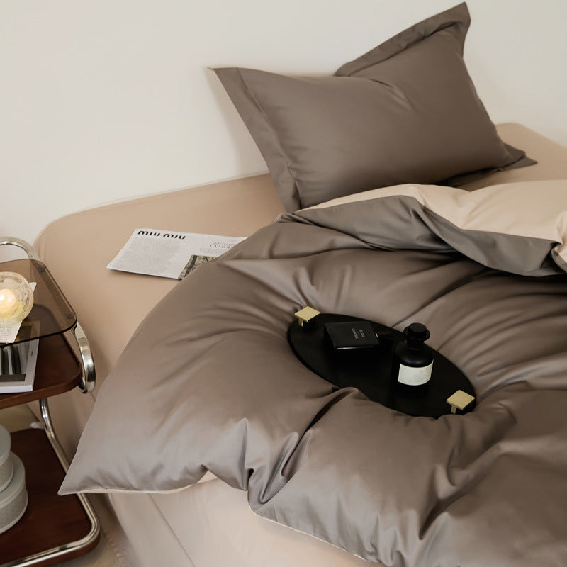 Parure de lit quatre pièces en laine et coton, draps en pur coton