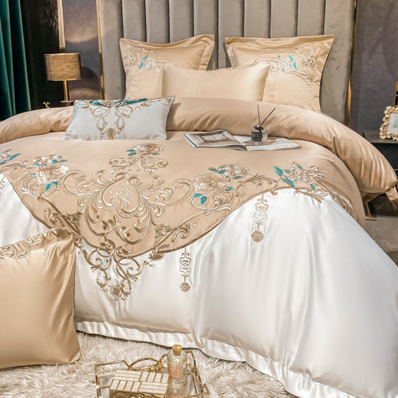 Parure de lit de luxe quatre pièces avec broderie de fleurs de champagne européen