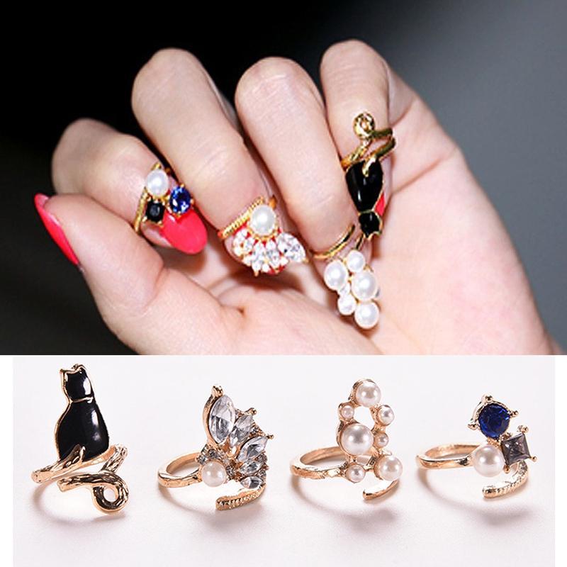 Pearl and rhinestone ring