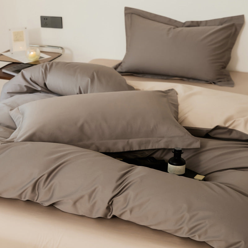 Parure de lit quatre pièces en laine et coton, draps en pur coton