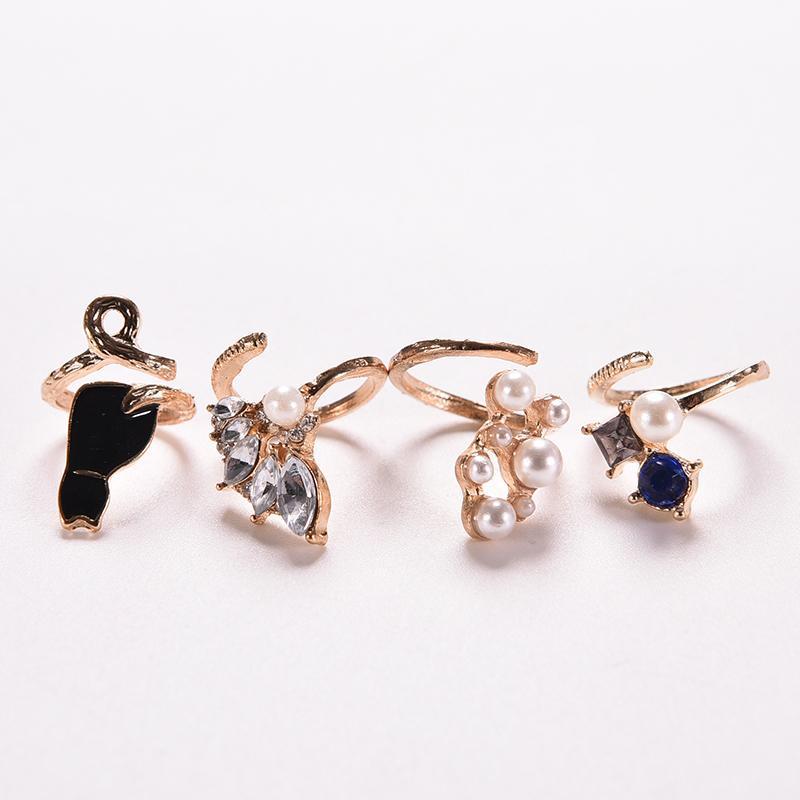 Pearl and rhinestone ring