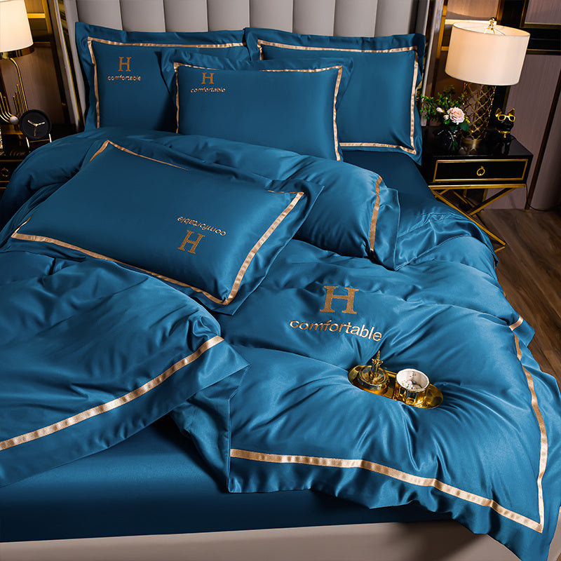 Ensemble de quatre draps de lit en soie glacée simple et tendance pour la maison