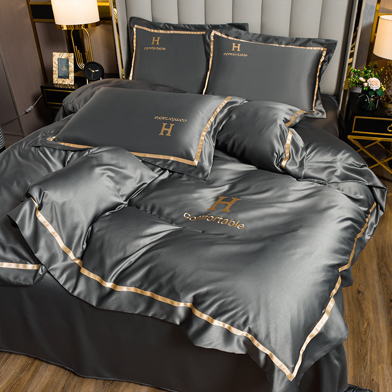 Ensemble de quatre draps de lit en soie glacée simple et tendance pour la maison