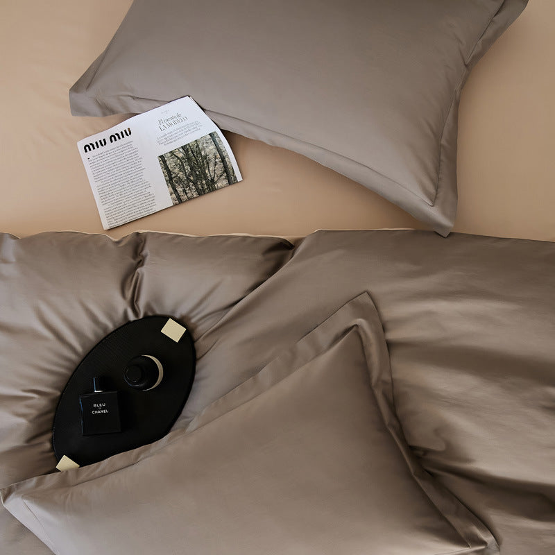 Parure de lit quatre pièces en laine et coton, draps en pur coton