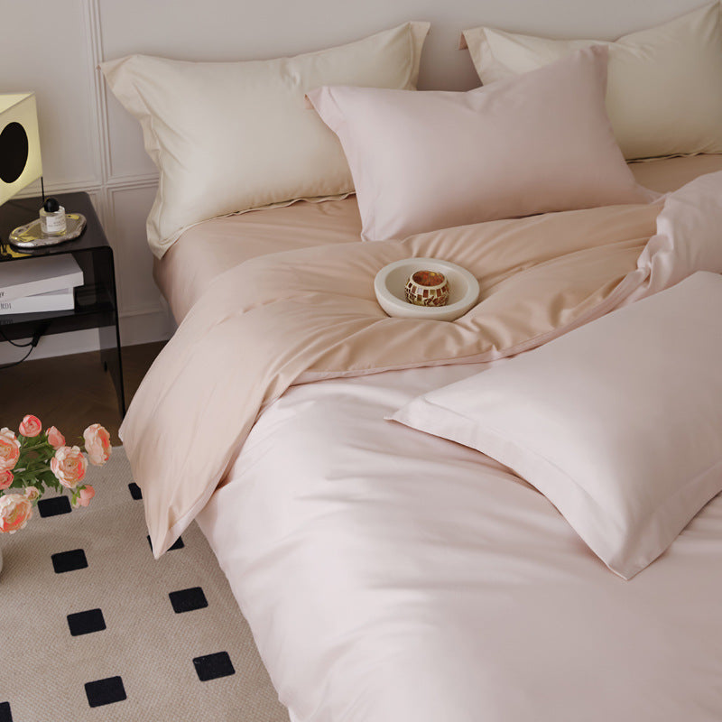 Parure de lit quatre pièces en laine et coton, draps en pur coton