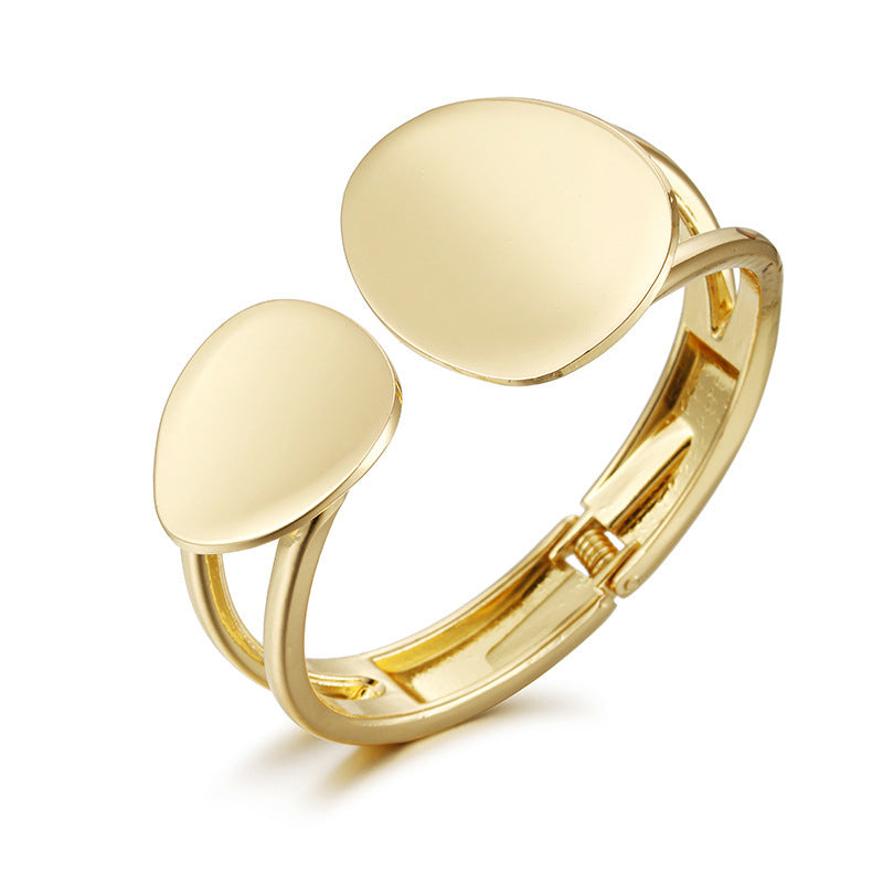 Trendy asymmetrical alloy spring bracelet