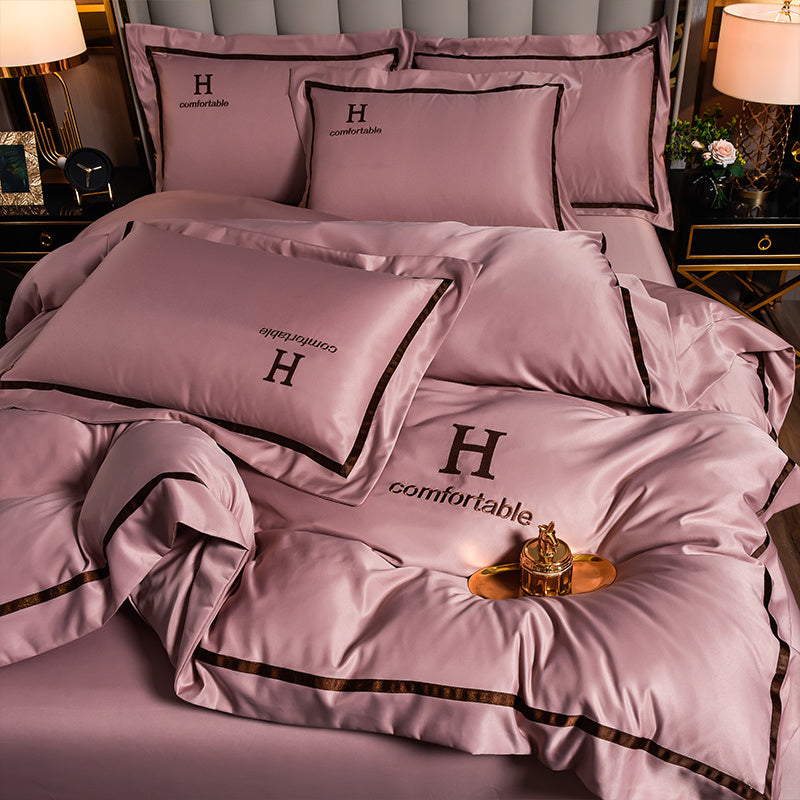 Ensemble de quatre draps de lit en soie glacée simple et tendance pour la maison