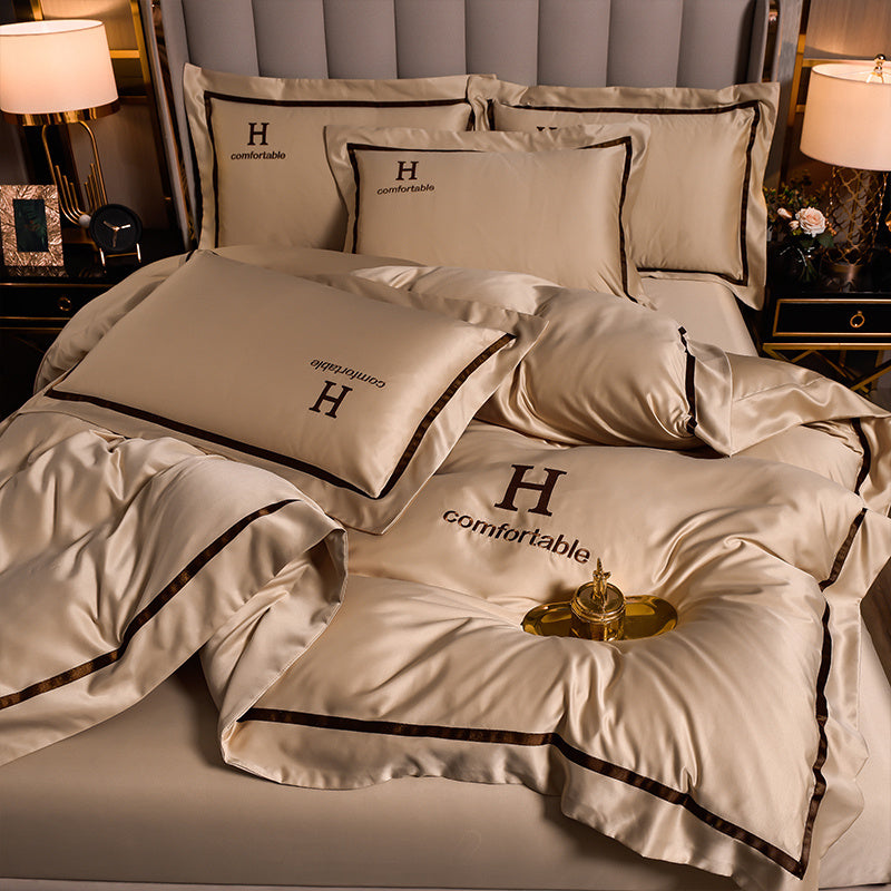 Ensemble de quatre draps de lit en soie glacée simple et tendance pour la maison
