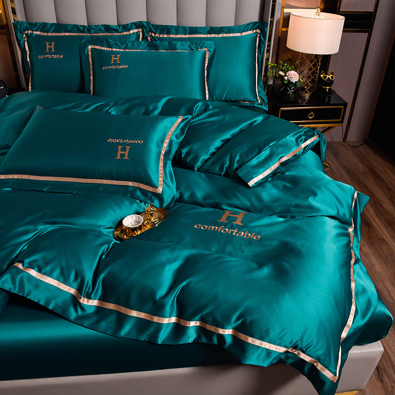 Ensemble de quatre draps de lit en soie glacée simple et tendance pour la maison