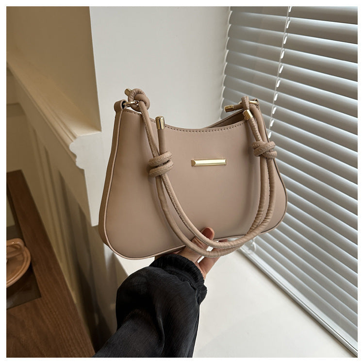 Small, high-end square bag for women