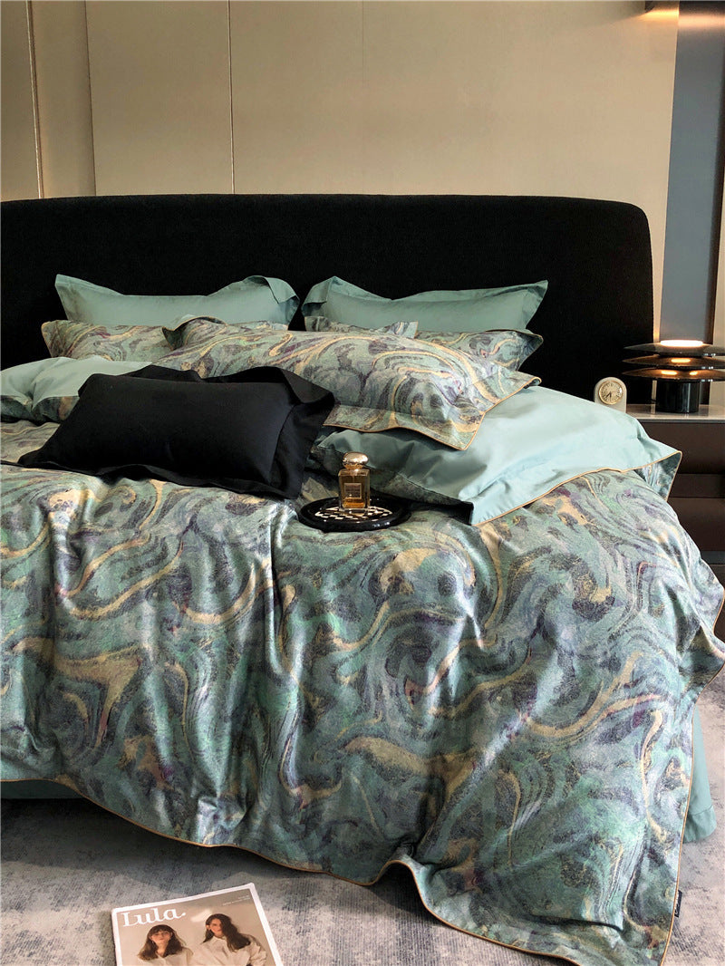 Parure de lit quatre pièces en coton imprimé à longues fibres