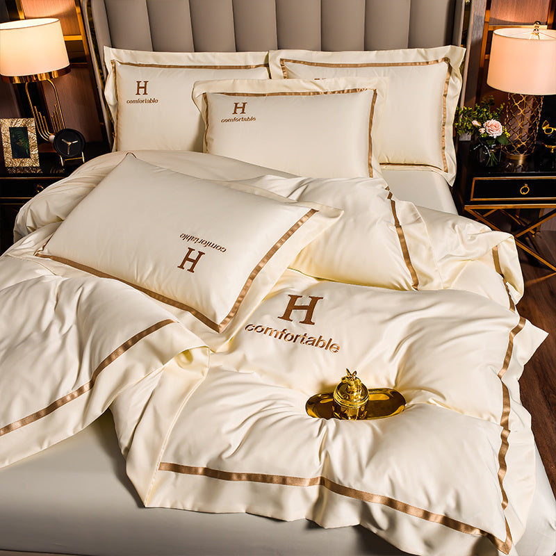 Ensemble de quatre draps de lit en soie glacée simple et tendance pour la maison
