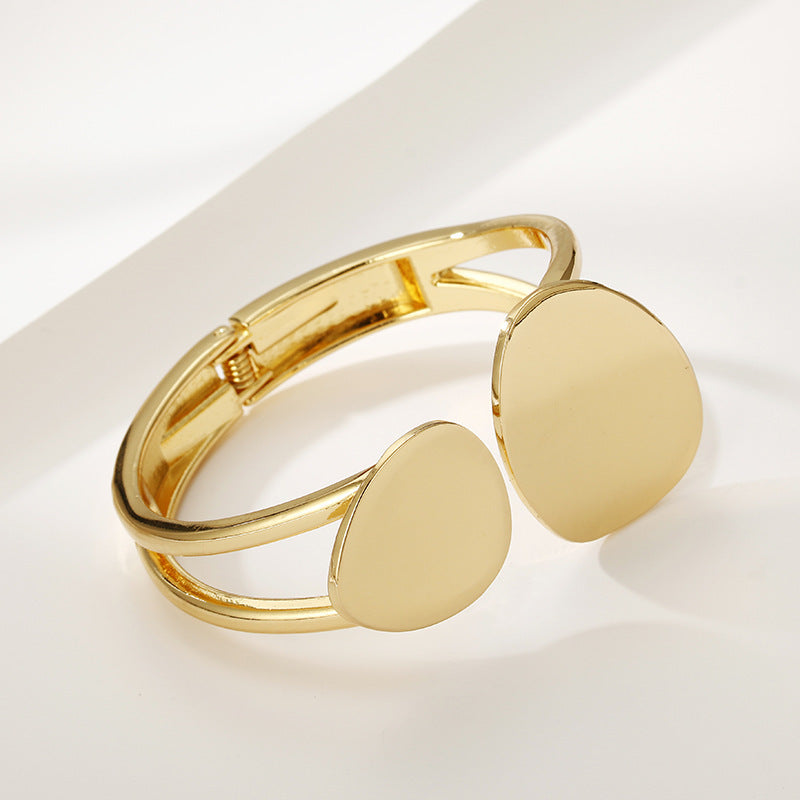 Trendy asymmetrical alloy spring bracelet