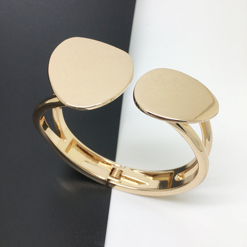 Trendy asymmetrical alloy spring bracelet