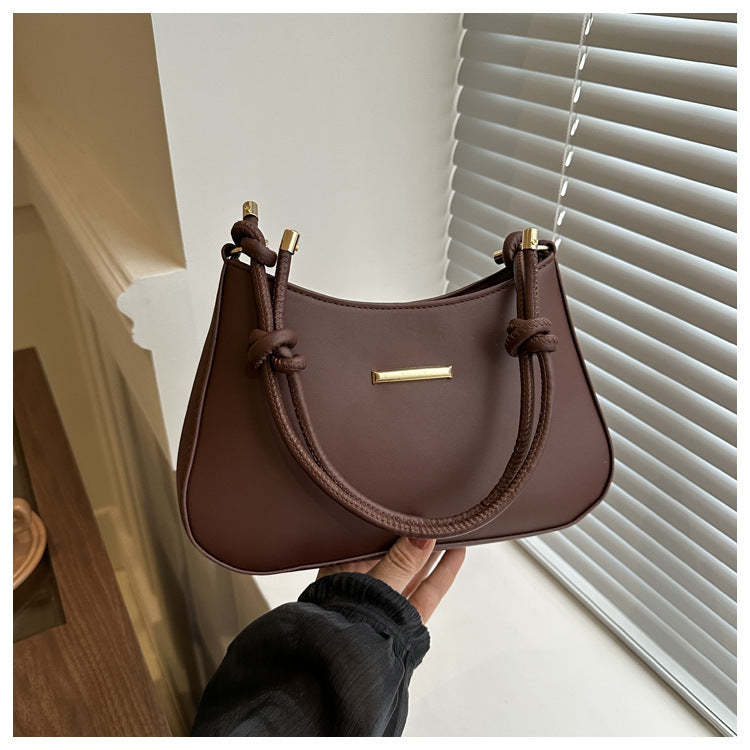 Small, high-end square bag for women
